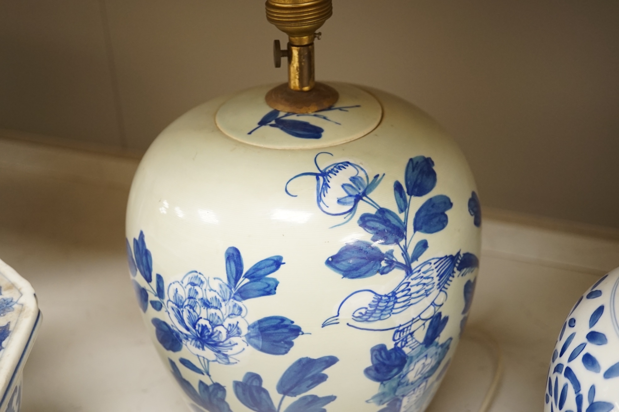 Two Chinese porcelain jars mounted as lamps and a similar blue and white octagonal jardiniere, largest 35cm wide. Condition - good (3)